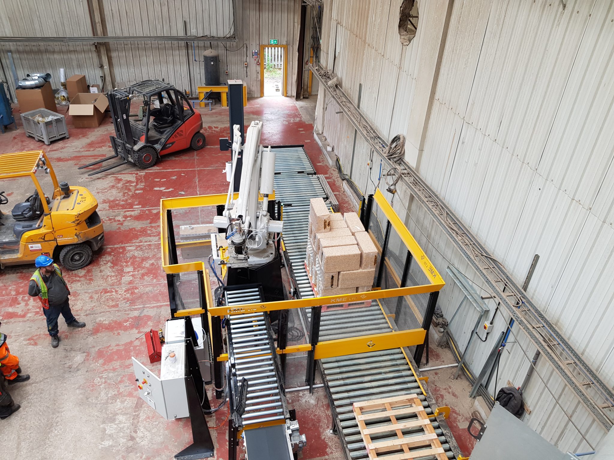 ABB Robot stacking Lay-soft wood shaving - Ken Mills Engineering Ltd