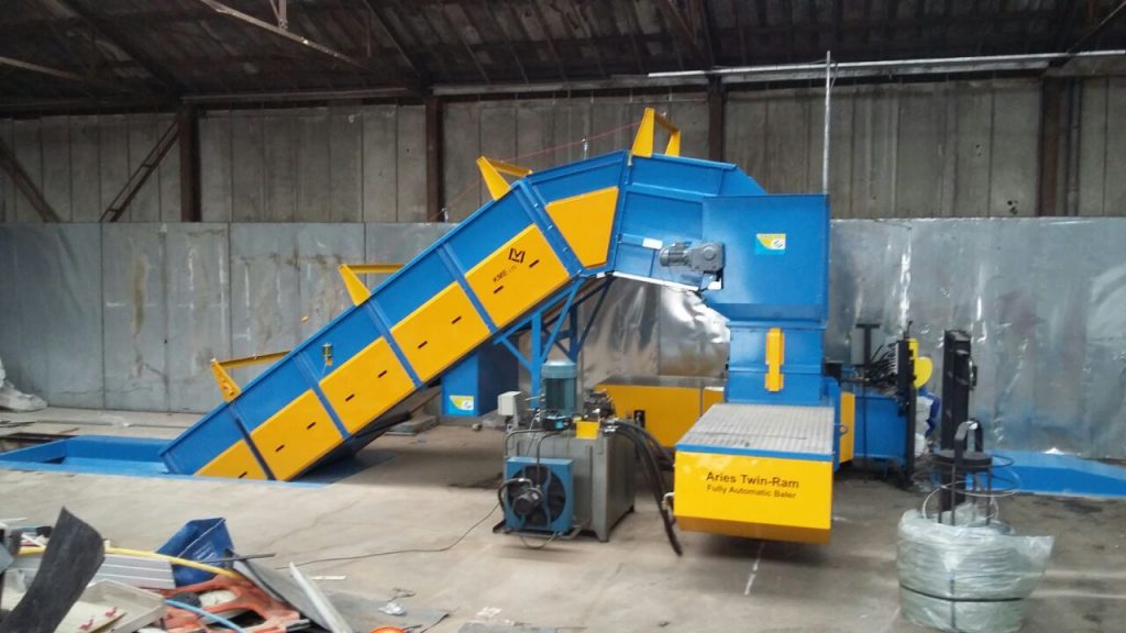 aries twin ram baler baling plastic waste - by KME ltd