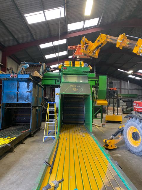 19 year old bale breaker sat next to a new bale breaker line for making small bale haylage